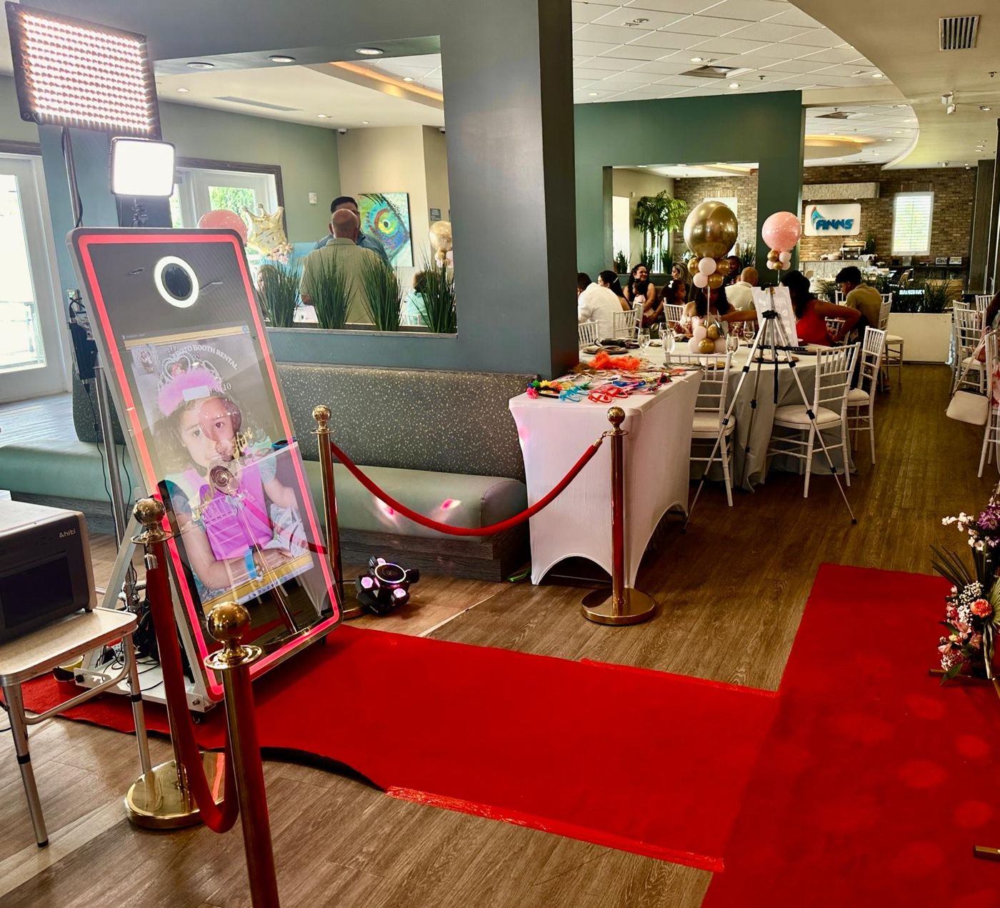 M'S 360 Photo Booth mirror booth and red carpet set up by Marcel at an Orlando event